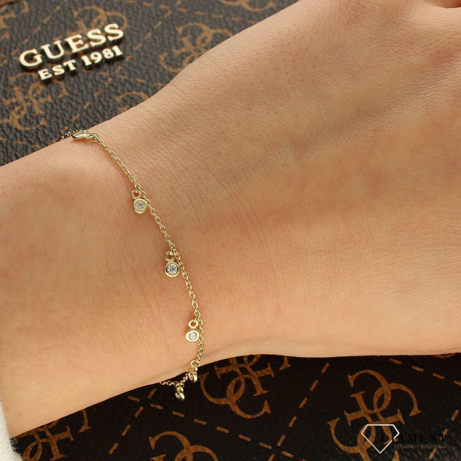 Złota bransoletka celebrytka łańcuszek z wiszącymi cyrkoniami BR 5105.jpg